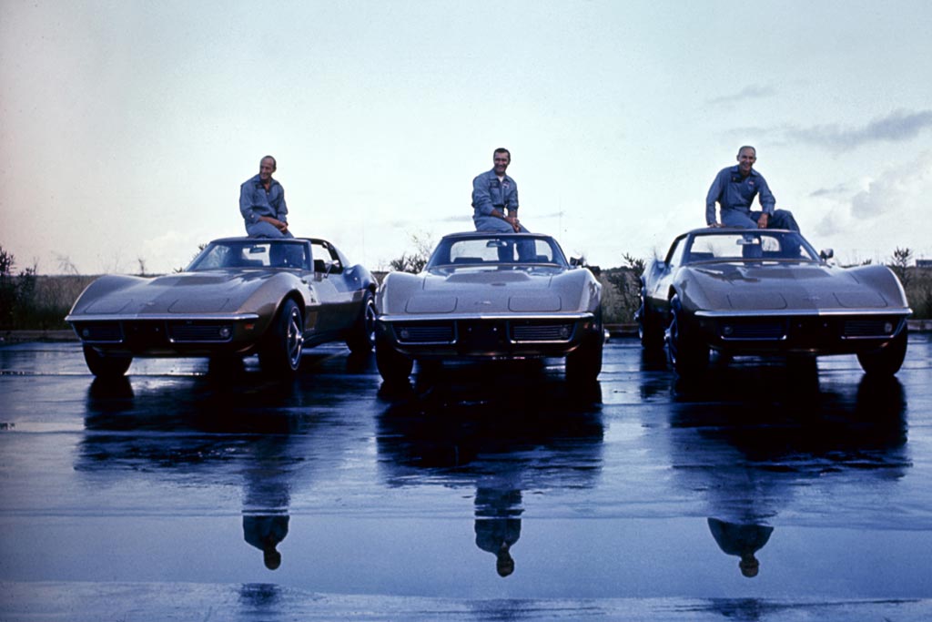 Apollo 12 astronauts (L-R) Charles 'Pete' Conrad Jr., Richard Francis Gordon Jr., and Alan LaVern Bean with their identical 1969 Corvette Stingray coupes.