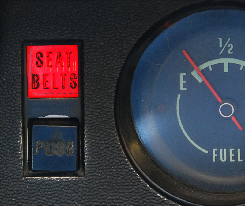 1968 "SEAT BELTS" warning light and reset button